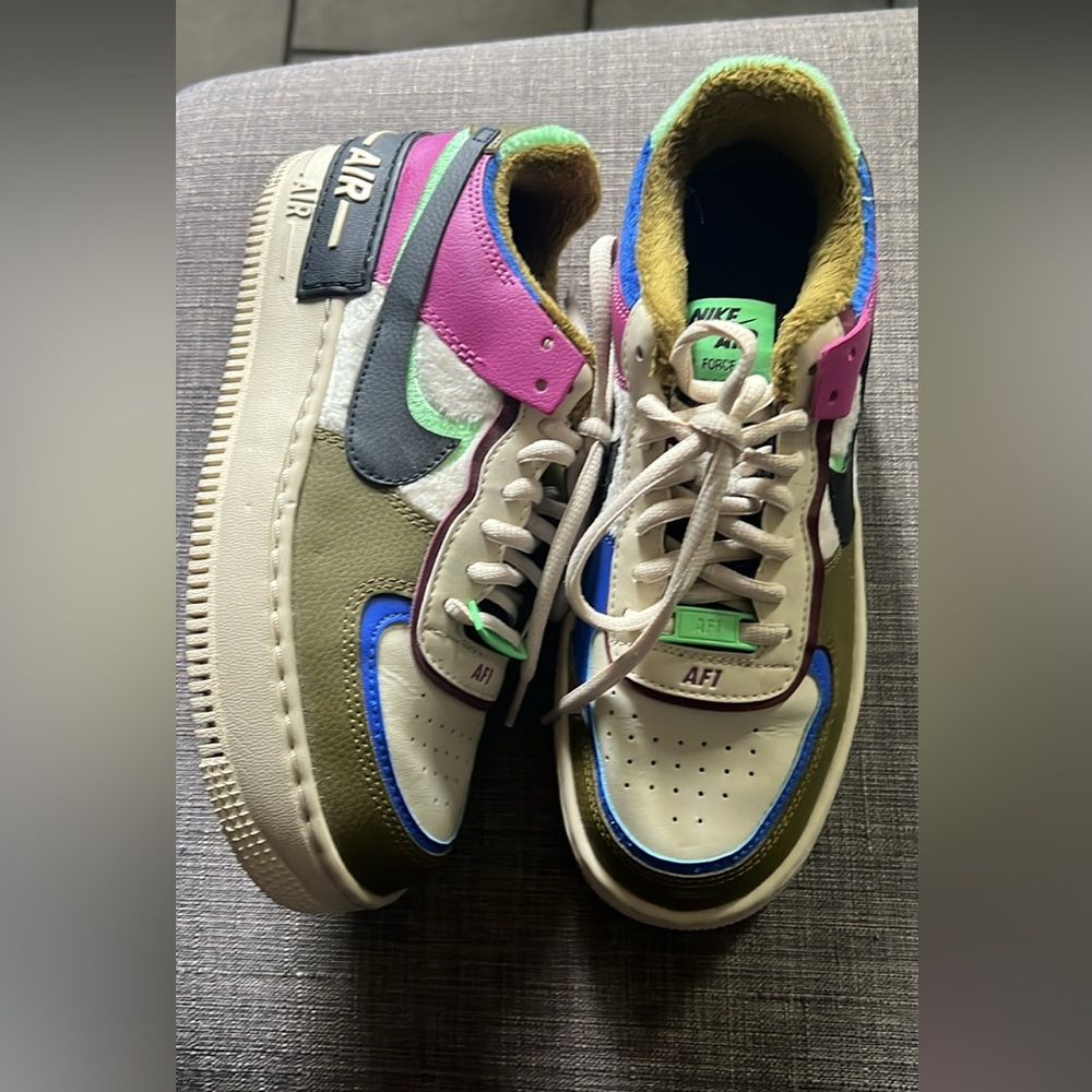 Used in like new condition two pairs of Women’s Nike Air Force Shadow